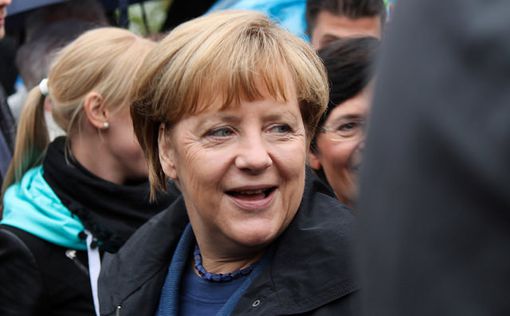 Партия Меркель побеждает на региональных выборах в Германии