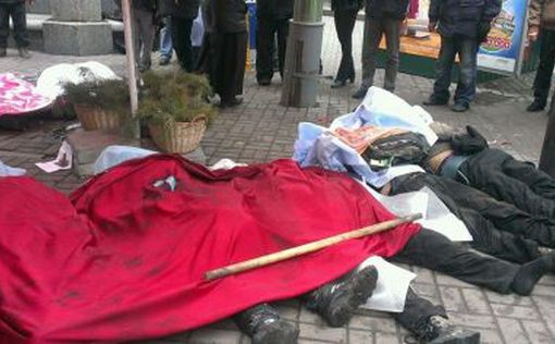 На Майдане Независимости 10 убитых в голову