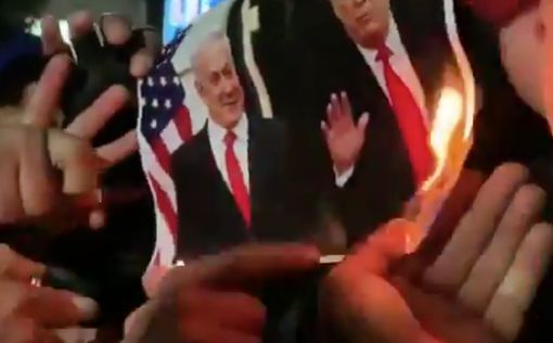 Палестинцы в Рамалле сжигают фотографии Нетаниягу и Трампа